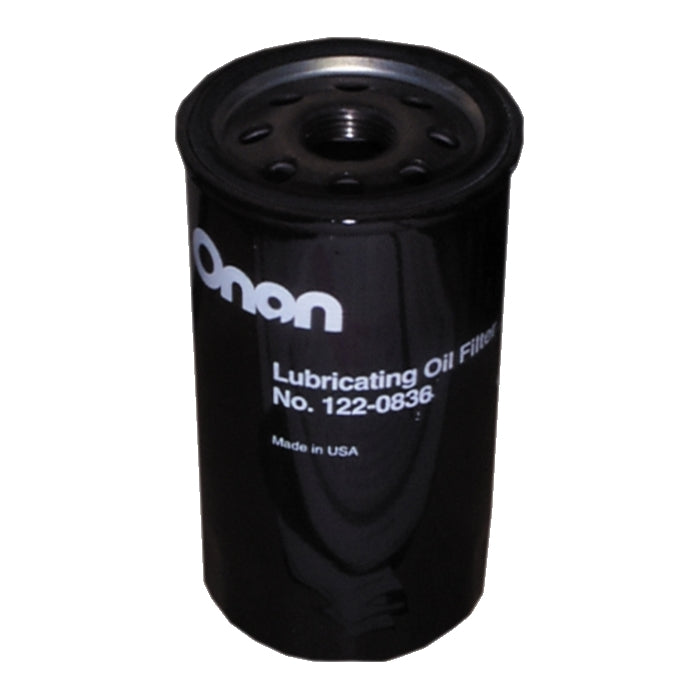 A black Cummins generator oil filter with white text indicating the model number and other details.