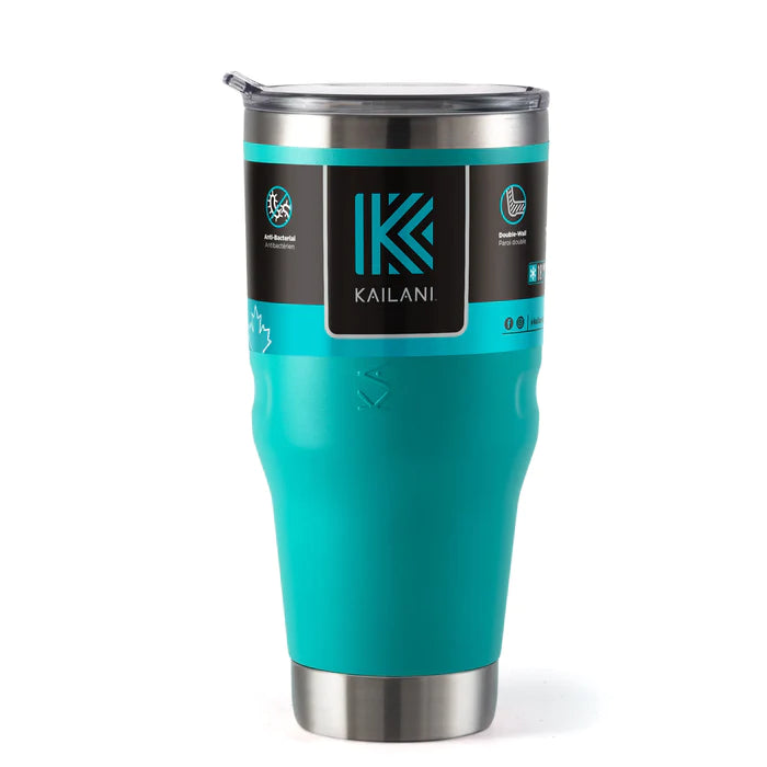 A teal insulated travel tumbler with a stainless steel lid and base, featuring a black and teal label with the Kailani brand logo.