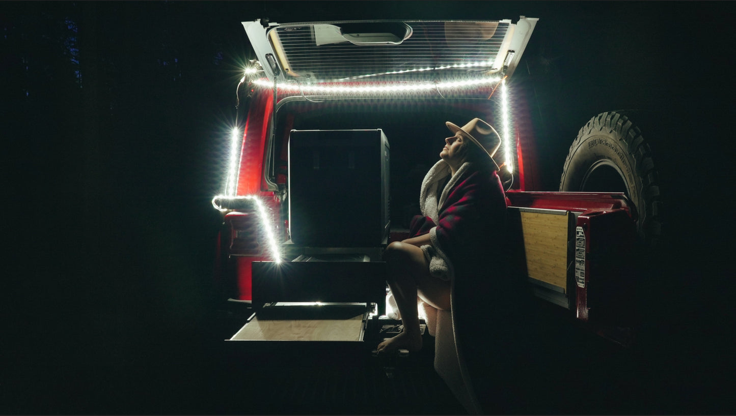 Flexible and water-resistant Kuma Galaxy LED Light Strip in action around a tent.