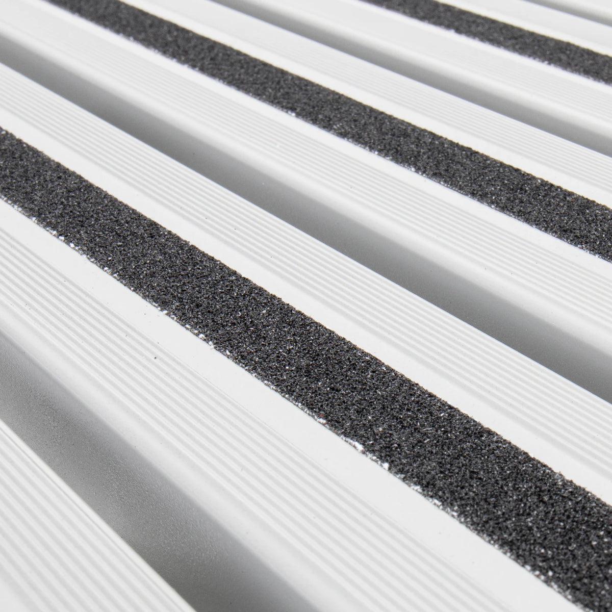 Camco RV platform step with grip tape surface