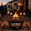 KUMA Off-Grid Hex Fire Bowl and Camco roasting forks creating a complete campfire experience at an RV campsite.