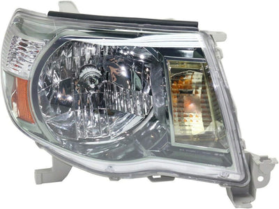 A Toyota Tacoma passenger side replacement headlight assembly with a clear lens and chrome-plated housing.