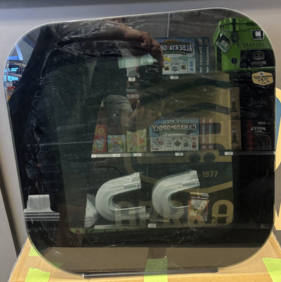 A insulated frameless 3000 window with a screen, displayed on a table