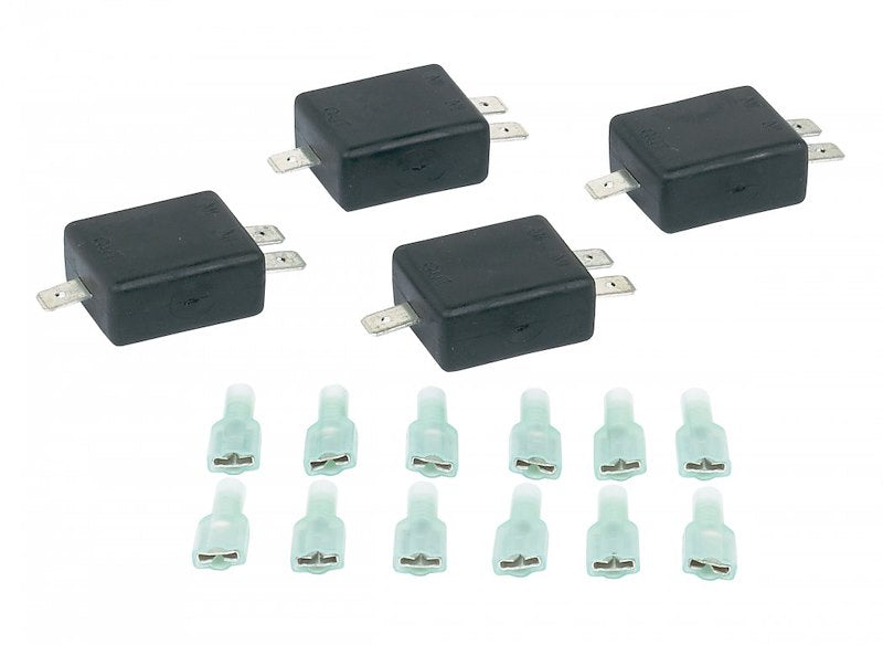 A set of black isolating diodes and green mating spade connectors.