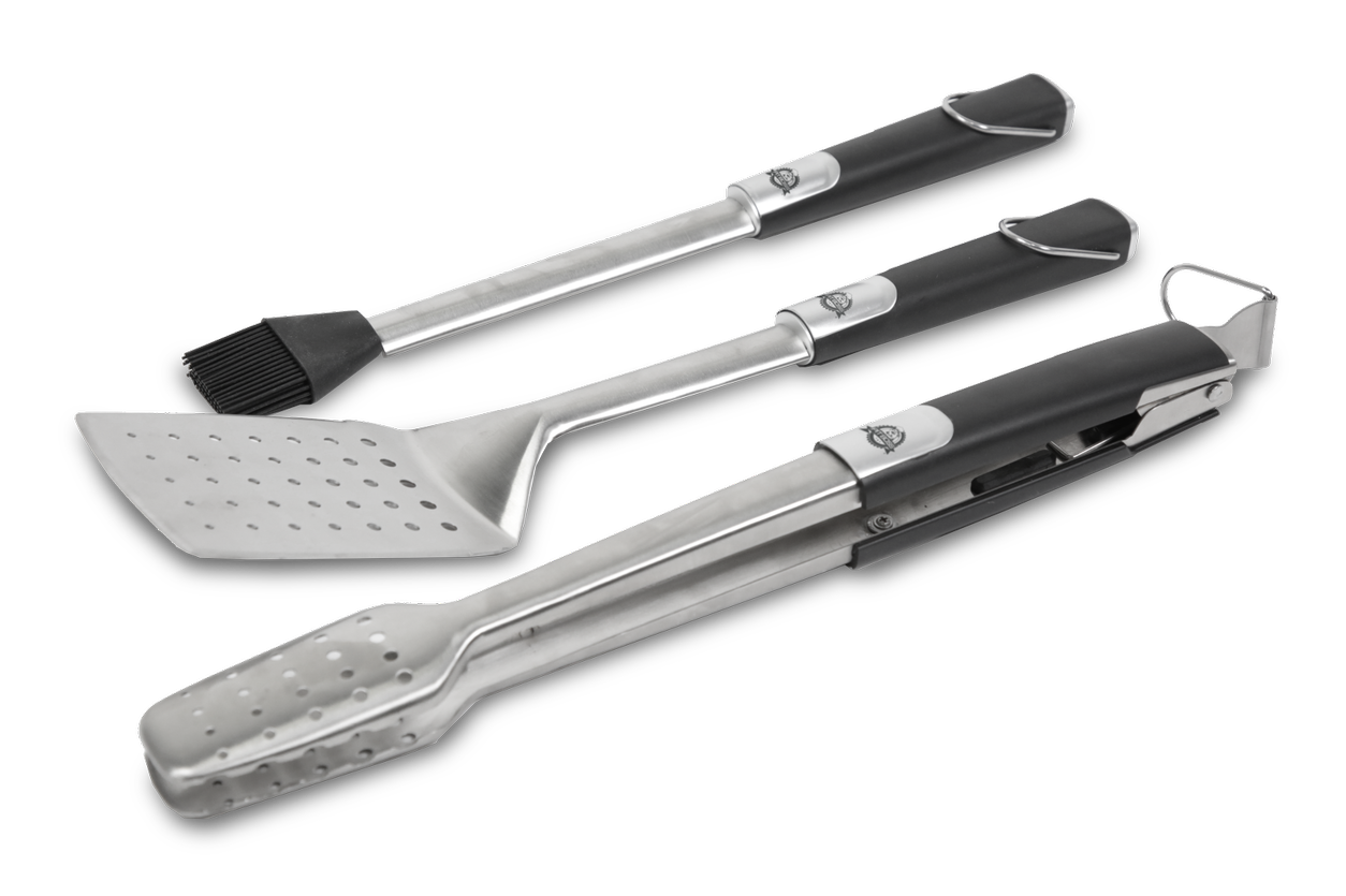 Set of three BBQ tools including a spatula, fork, and grill brush on a white background.