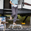 Person using a step stool to enter an RV
