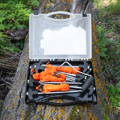 Heavy duty tent pegs installed in campsite ground