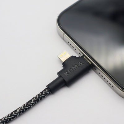 KUMA micro USB cable connected to a smartphone on a light gray background