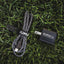 Kuma outdoor gear charging cable and adapter on grass