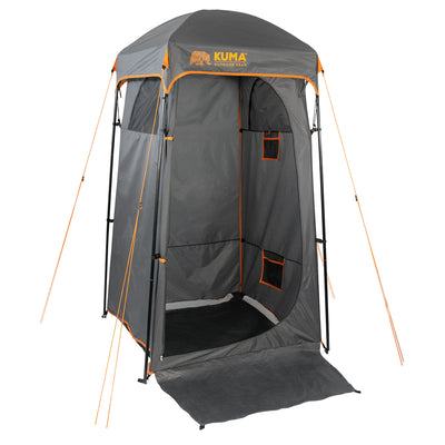 Kuma Peaks Privacy Shelter set up outdoors with open door.