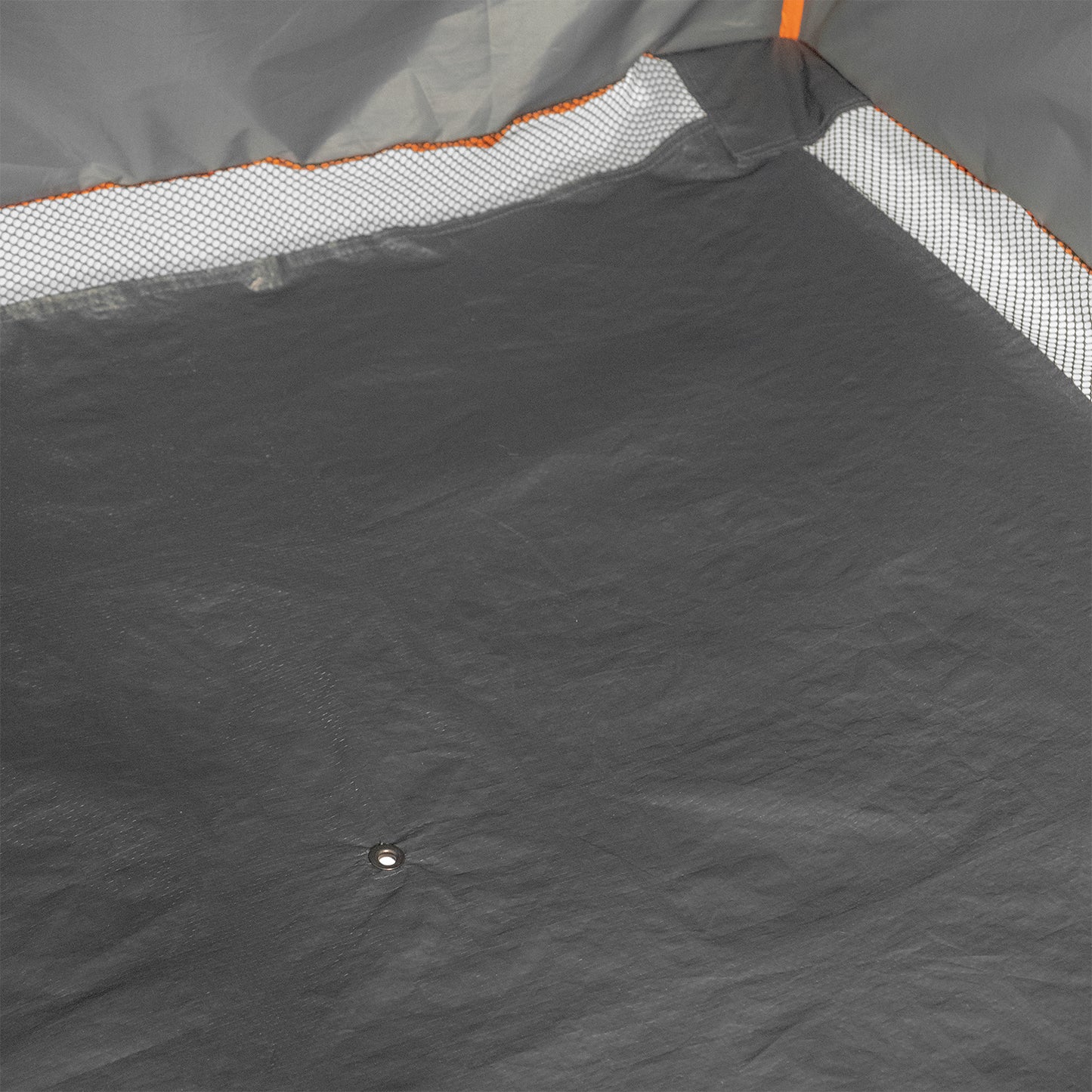 Interior view of the privacy tent showing mesh pockets and floor drainage.