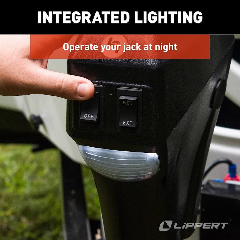 Hand operating a jack switch with integrated lighting feature, Lippert brand visible.