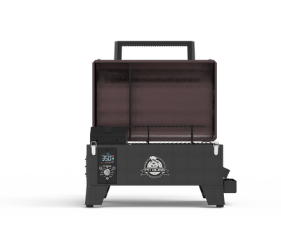 Tabletop pellet grill set up for tailgating with wood pellets

