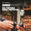 Southwire SurgeGuard 50A Portable Surge Protector being connected outdoors by two hands, with a wooded leaf-covered ground background and product text overlay.
