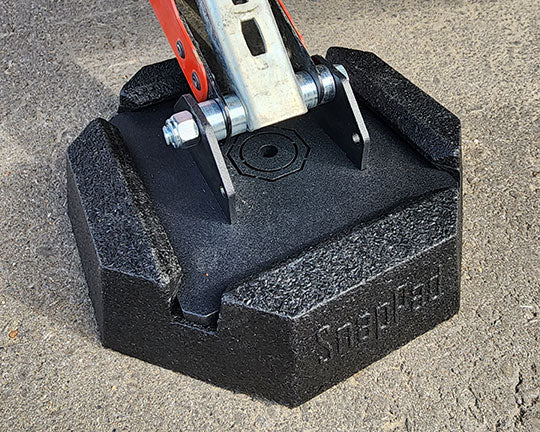 SnapJack SJ scissor jack pad installed on RV
