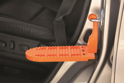 Moki Ascent step mounted on vehicle door striker for roof access
