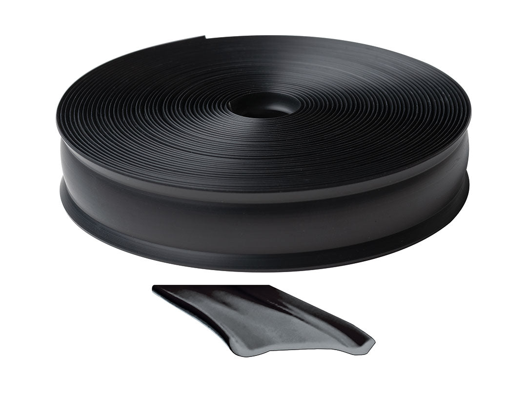 Roll of black rv trim molding insert with a small cutout on a white background