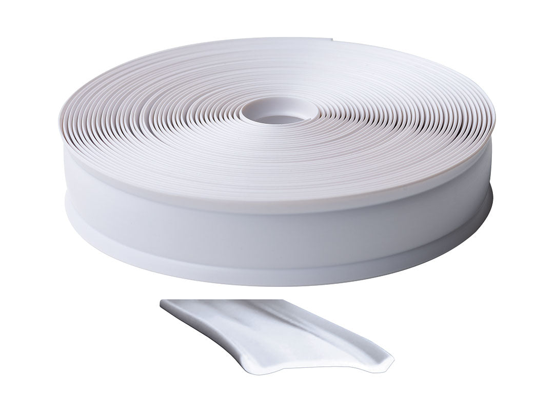 Roll of white rv trim molding insert on a white background