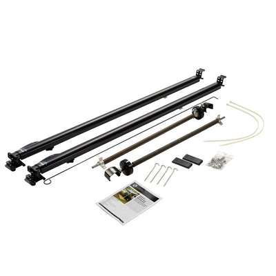 Black awning hardware kit including mounting arms, roll-up mechanism, and other components laid out on a white background, with an included installation manual.