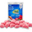 A package of Camco TST-Max drop-in treatment with several pink gel packets placed in front on a white background.