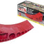 A red-colored Andersen Rapid Jack, a heavy-duty trailer tire ramp and leveler, displayed alongside its packaging box.