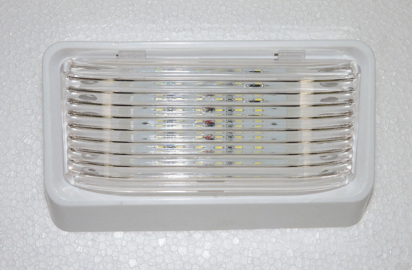 Clear lens RV porch/cabin light, 12.8V DC, 1.4A

