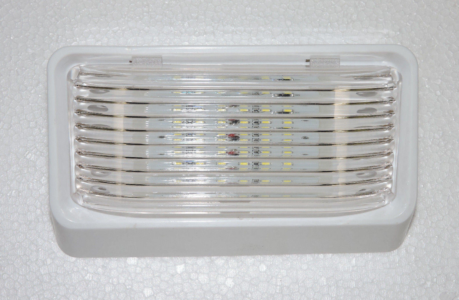 Clear lens RV porch/cabin light, 12.8V DC, 1.4A
