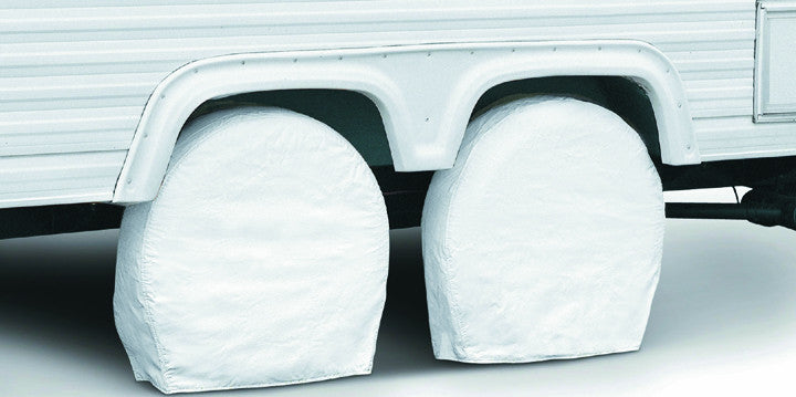 Classic Accessories 76270 white vinyl tire covers installed on motorhome tires
