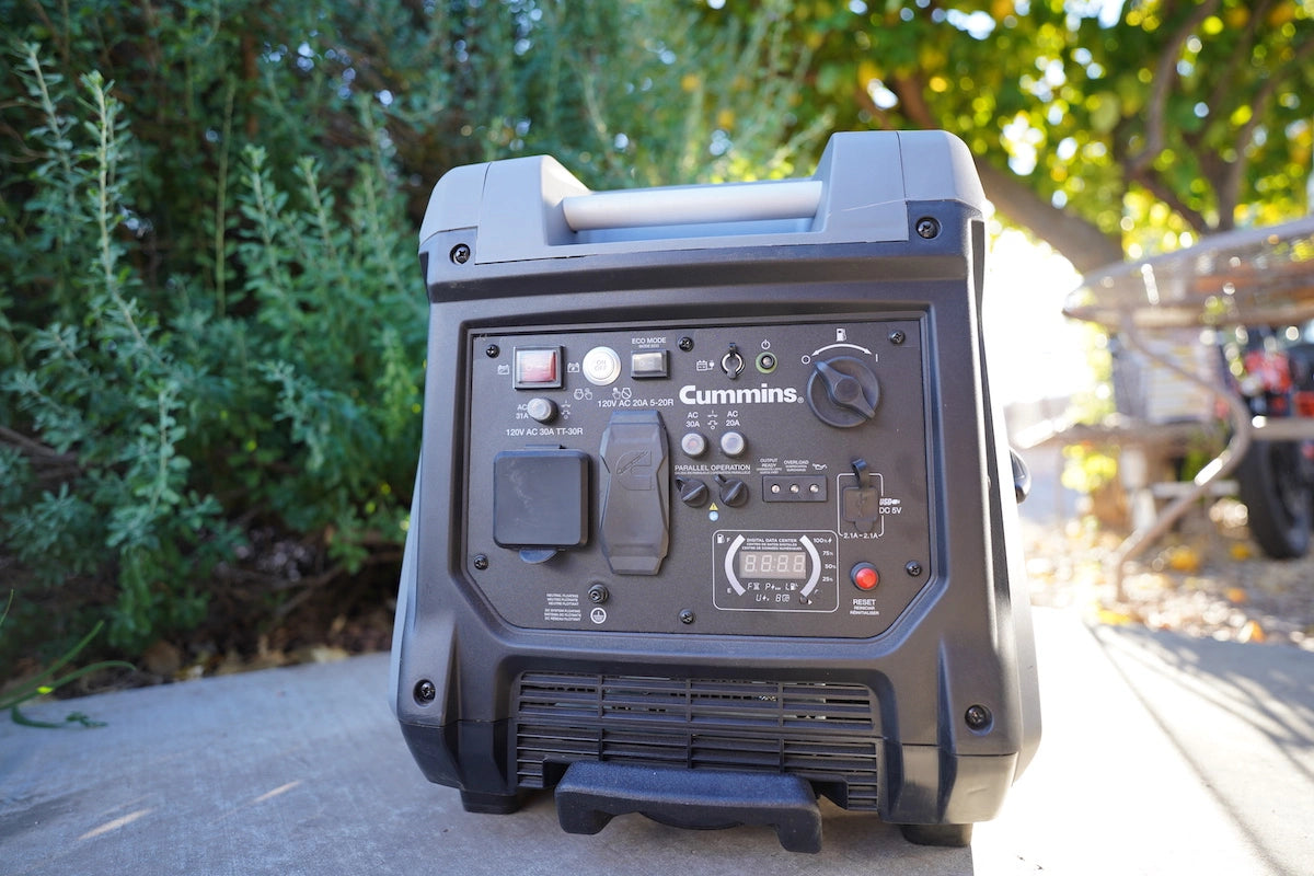 Cummins Onan P4500i generator powering an RV at a campsite